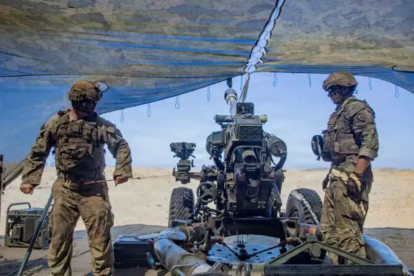 U.S. Army soldiers from the 3rd Battalion, 7th Field Artillery Regiment, 25th Infantry Division fire an M119A3 105mm howitzer during a counter-landing live-fire exercise at La Paz Sand Dunes in Laoag City, Philippines, on May 4, 2026, as part of Exercise Balikatan 2026 (Picture source: U.S. DoW).