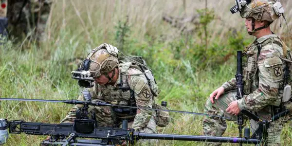 At Camp Beauregard, Louisiana, soldiers from Sioux Company, Multi-Purpose Company, 3rd Brigade, 10th Mountain Division, prepare to launch a Ghost-X Medium-Range Reconnaissance drone while operating the Soldier Borne Mission Command Surrogate system during a field training exercise.