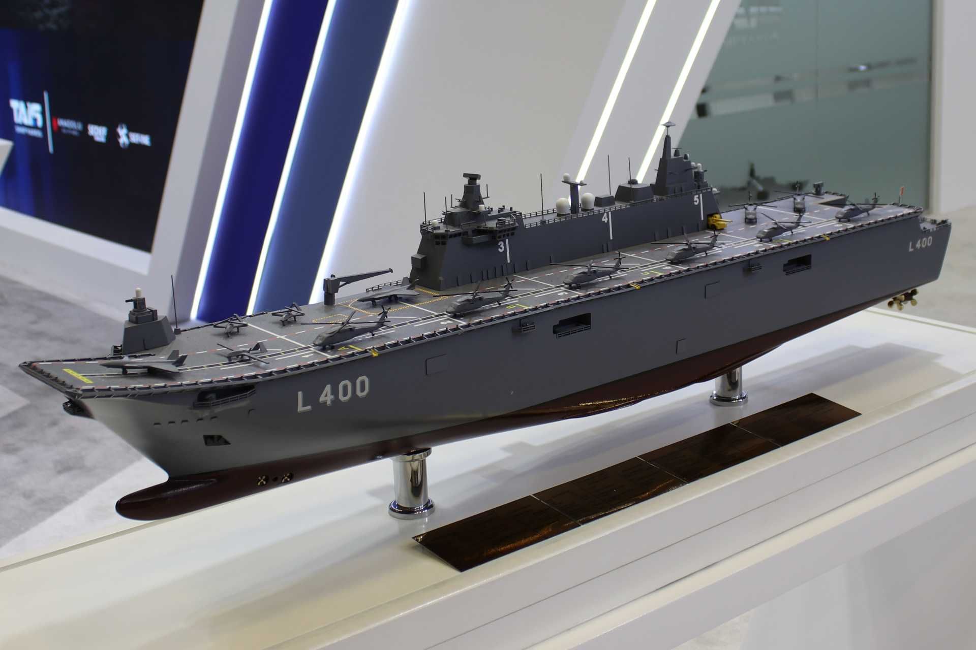 A landing helicopter dock, such as the LHD-230, is a multipurpose amphibious assault ship that combines helicopter carrier functions with dock landing ship functions, typically using a full-length flight deck plus a well dock for launching landing craft and amphibious vehicles. (Picture source: Army Recognition)