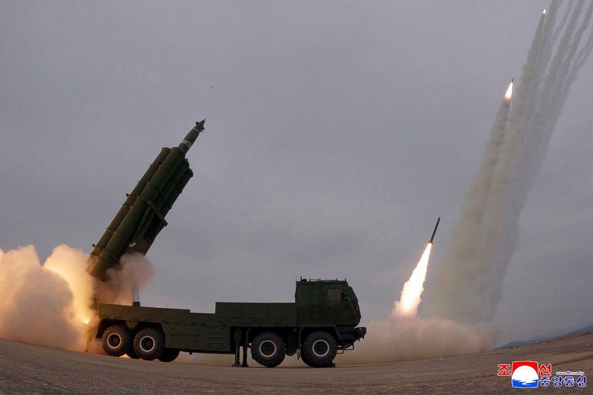 A North Korean KN-25 fires a 600 mm rocket during a military drill, demonstrating a long-range precision strike system designed to threaten regional airbases and military infrastructure.