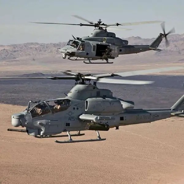 AH-1Z Viper and UH-1Y Venom helicopters fly in formation, showcasing their versatility and combat readiness (U.S. Marine Corps)