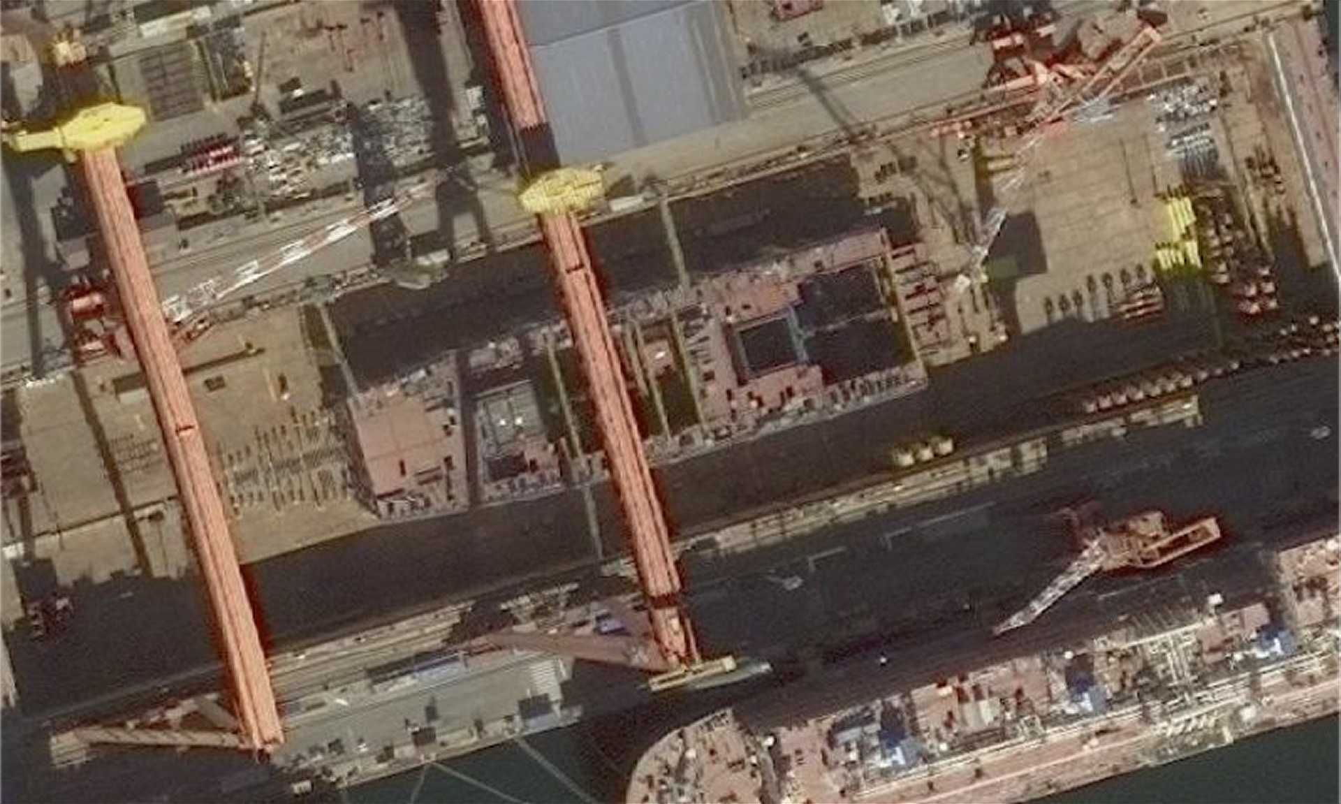 Satellite image published in December 2025 by PLA Military Updates on X shows China’s Type 004 nuclear aircraft carrier under construction at Dalian, with an estimated displacement of 110,000 to 120,000 tons and sea trials projected between mid-2028 and early 2029.