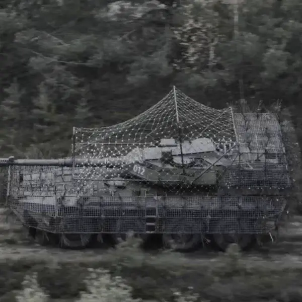 Screenshot from the 78th Air Assault Regiment video released on Nov. 9, 2025 showing a Centauro B1 in frontline use in Ukraine fitted with improvised anti-drone screens.