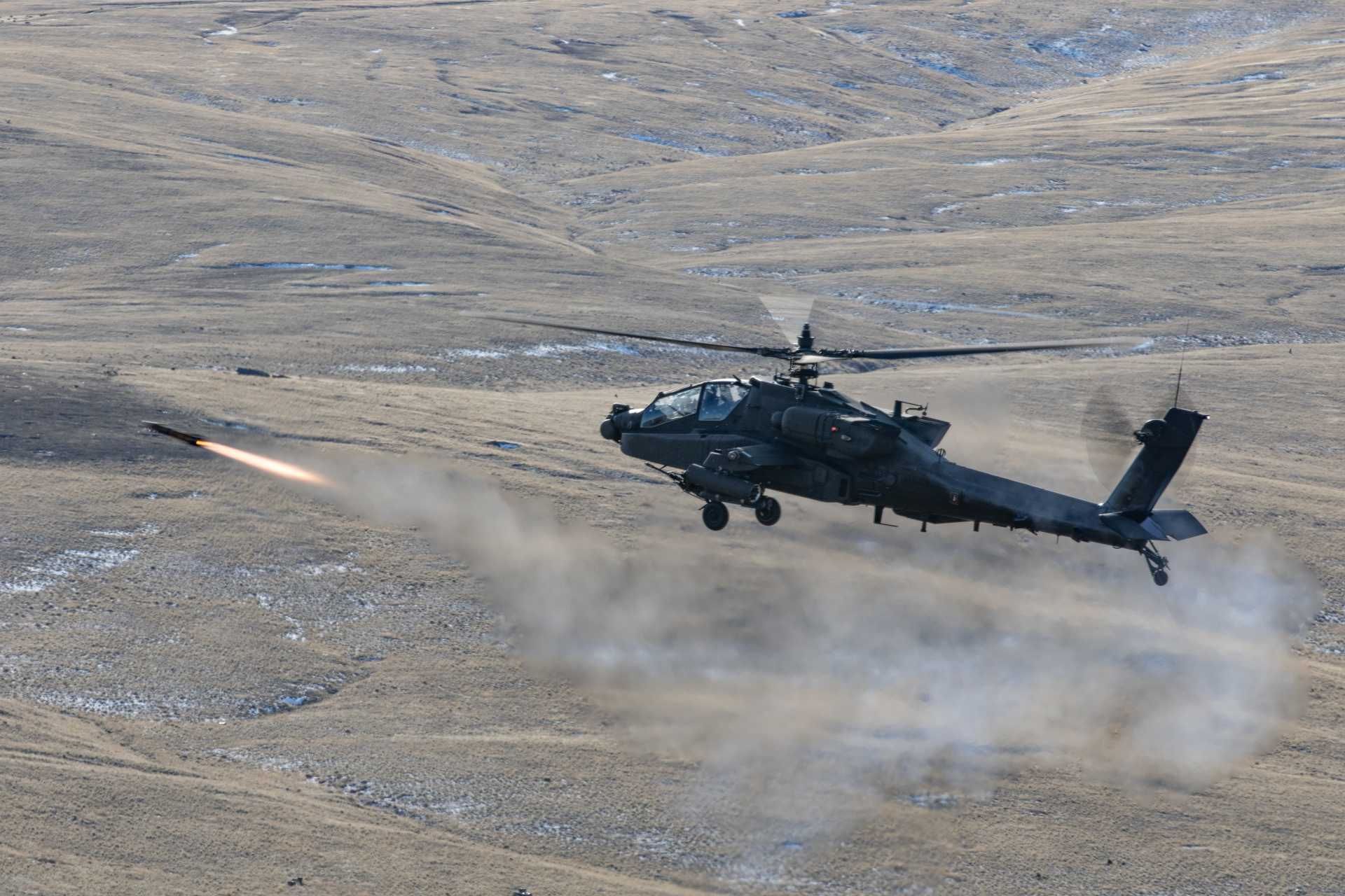 Illustrative image showing a U.S. Army AH-64E Apache Guardian attack helicopter launching an AGM-114 Hellfire missile. CENTCOM reported that a U.S. aircraft fired two Hellfire missiles to disable the engine room of the Guinea-Bissau-flagged tanker M/T Jalveer in the Gulf of Oman on June 10, 2026, after the vessel allegedly failed to comply with U.S. directives. The image is not related to the actual operation.
