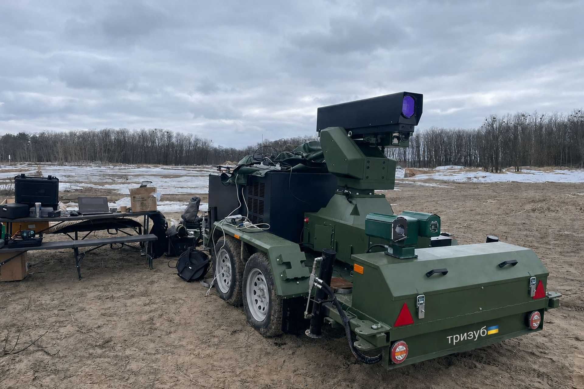 Mounted on a trailer, the latest variant of the Tryzub laser weapon integrates AI-assisted terminal guidance, automatic target acquisition and tracking, and radar-linked trajectory processing to improve its effectiveness against Russian drones. (Picture source: Celebra Tech)