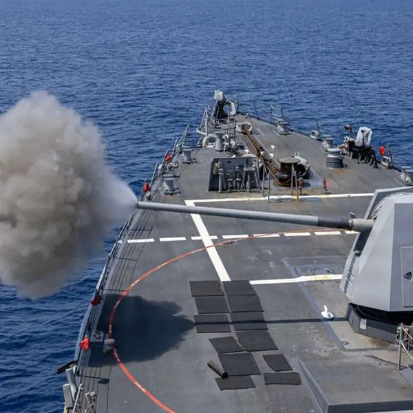 USS Mustin (DDG 89) fires its Mk 45 Mod 4 5-inch naval gun during a live-fire exercise in the Western Pacific, demonstrating the destroyer’s close-range sea control, naval gunfire support, and forward-deployed combat readiness with U.S. 7th Fleet (Picture source: U.S. DoW).