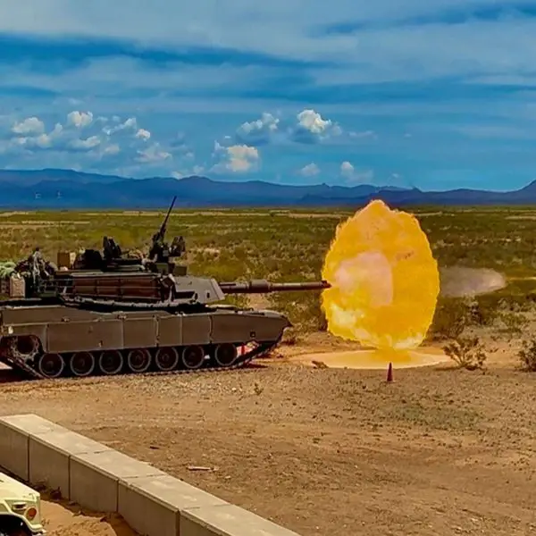 U.S. Army M1A2 Abrams main battle tanks from the 1st Battalion, 67th Armored Regiment, 3rd Armored Brigade Combat Team, conduct live-fire accuracy screening at a desert training range to verify 120mm gun precision, fire-control settings, and crew readiness before qualification (Picture source: U.S. DoW).