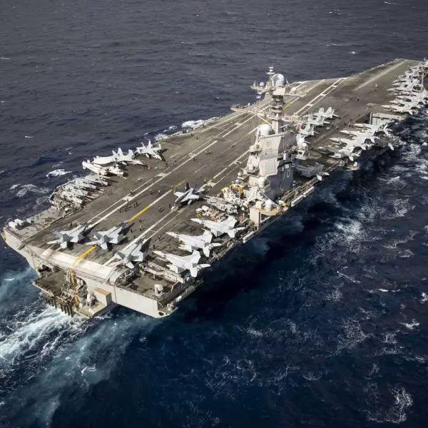 U.S. Navy sailors conduct flight deck operations aboard USS Gerald R. Ford (CVN-78) in the Eastern Mediterranean Sea on March 22, 2026, illustrating the high-tempo air operations capability supporting U.S. multi-carrier deployments.