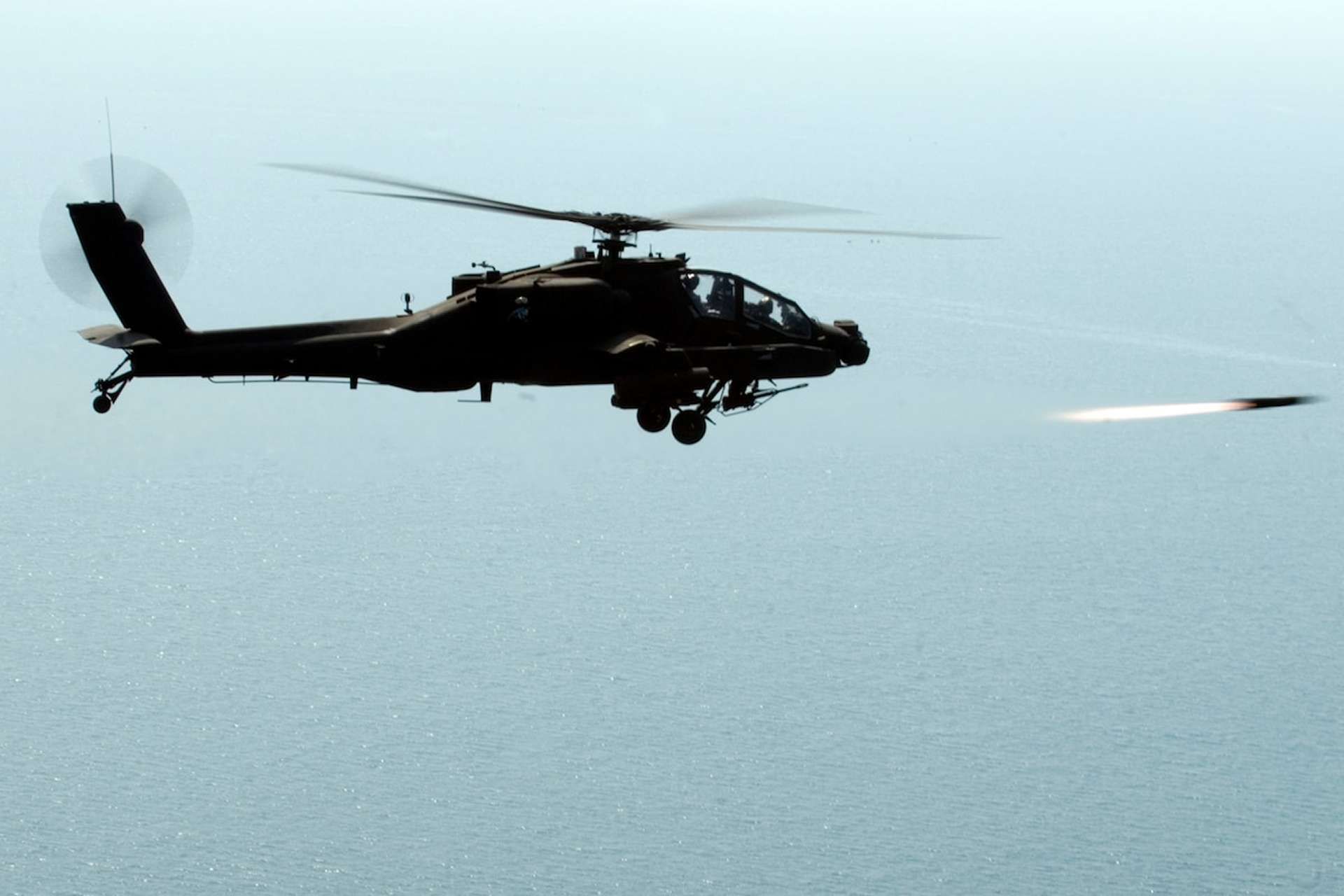 U.S. Army AH-64 Apache and U.S. Navy MH-60 Seahawk helicopters sank six Iranian fast boats near the Strait of Hormuz, demonstrating a rapid counter-swarm capability to protect commercial shipping under Project Freedom (Picture source: U.S. DoW).