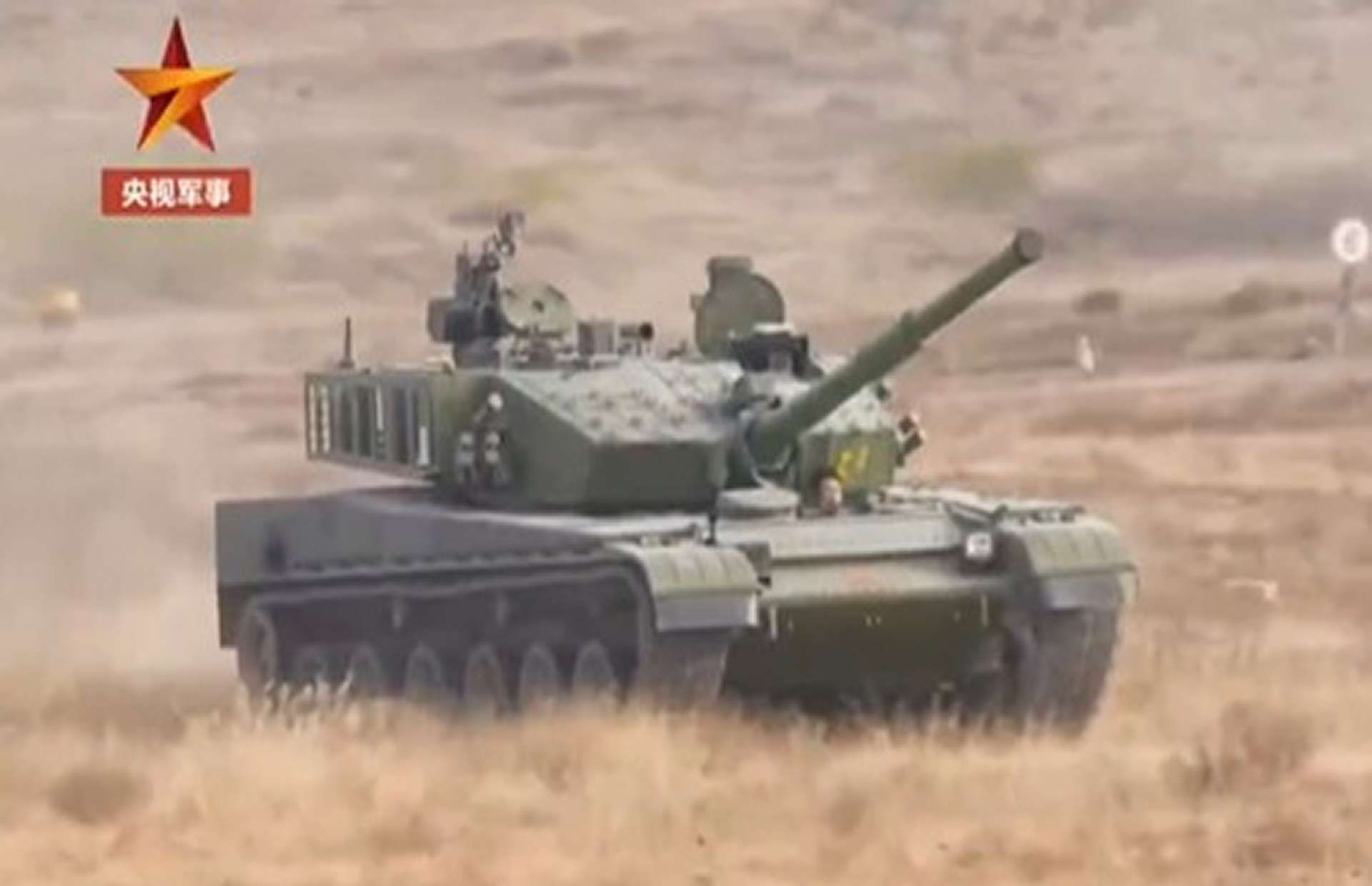 Type 99B is China’s latest heavy tank, combining a 125mm gun with upgraded sensors, networking, and survivability for faster all-weather combat, including high altitude operations (Picture source: Chinese TV).