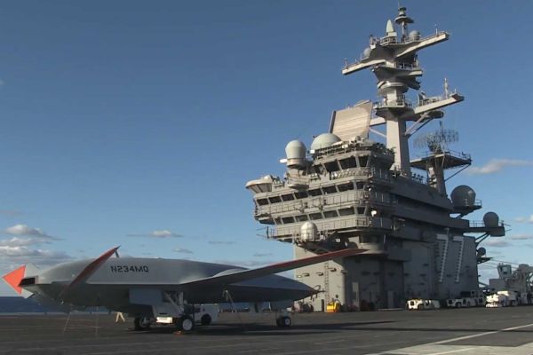Boeing’s MQ-25 Stingray test aircraft conducts carrier deck operations aboard USS George H.W. Bush (CVN-77) in December 2021, marking a major milestone toward integrating autonomous aerial refueling drones into future U.S. Navy carrier air wings.