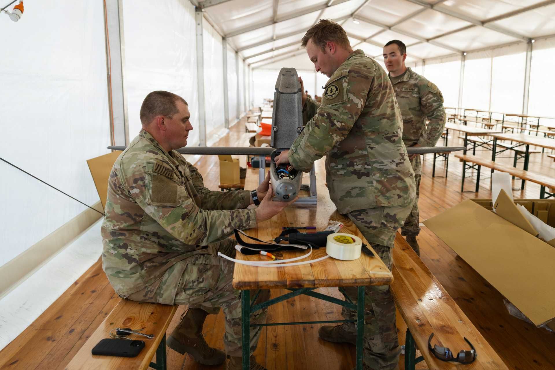 U.S. Army Staff Sgt. Nicholas Davis and Staff Sgt. Terrence Giles of the Field Artillery Squadron, 2d Cavalry Regiment, assemble a Hornet one-way attack drone during training and tactical integration exercises at the Bemowo Piskie Training Area in Poland as part of NATO’s Eastern Flank Deterrence Initiative running from April 27 to May 31, 2026.