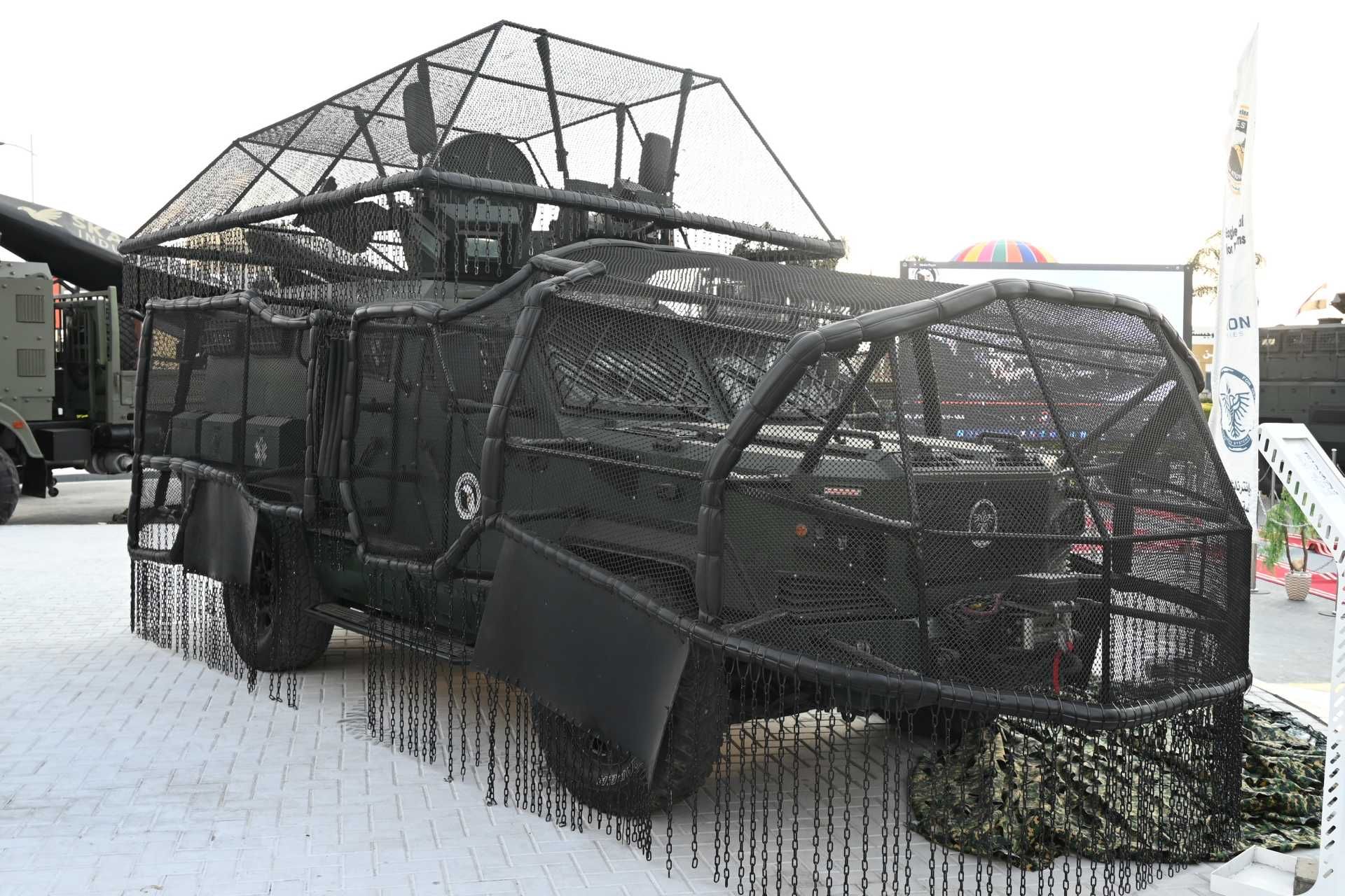 The intensification of drone attacks in Ukraine has led to a rapid expansion in the use of anti-drone mesh and cope cages to force incoming kamikaze drones to detonate or malfunction before reaching the vehicle’s most vulnerable surfaces. (Picture source: Army Recognition)