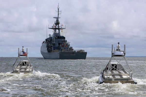 Global Autonomous Reconnaissance Craft (GARC) unmanned surface vessels maneuver alongside the Brazilian Navy Amazonas-class offshore patrol vessel Araguari (P122) during a robotic and autonomous systems demonstration conducted by U.S. Navy Task Force 66 as part of Exercise Obangame Express 2026 in Douala, Cameroon.