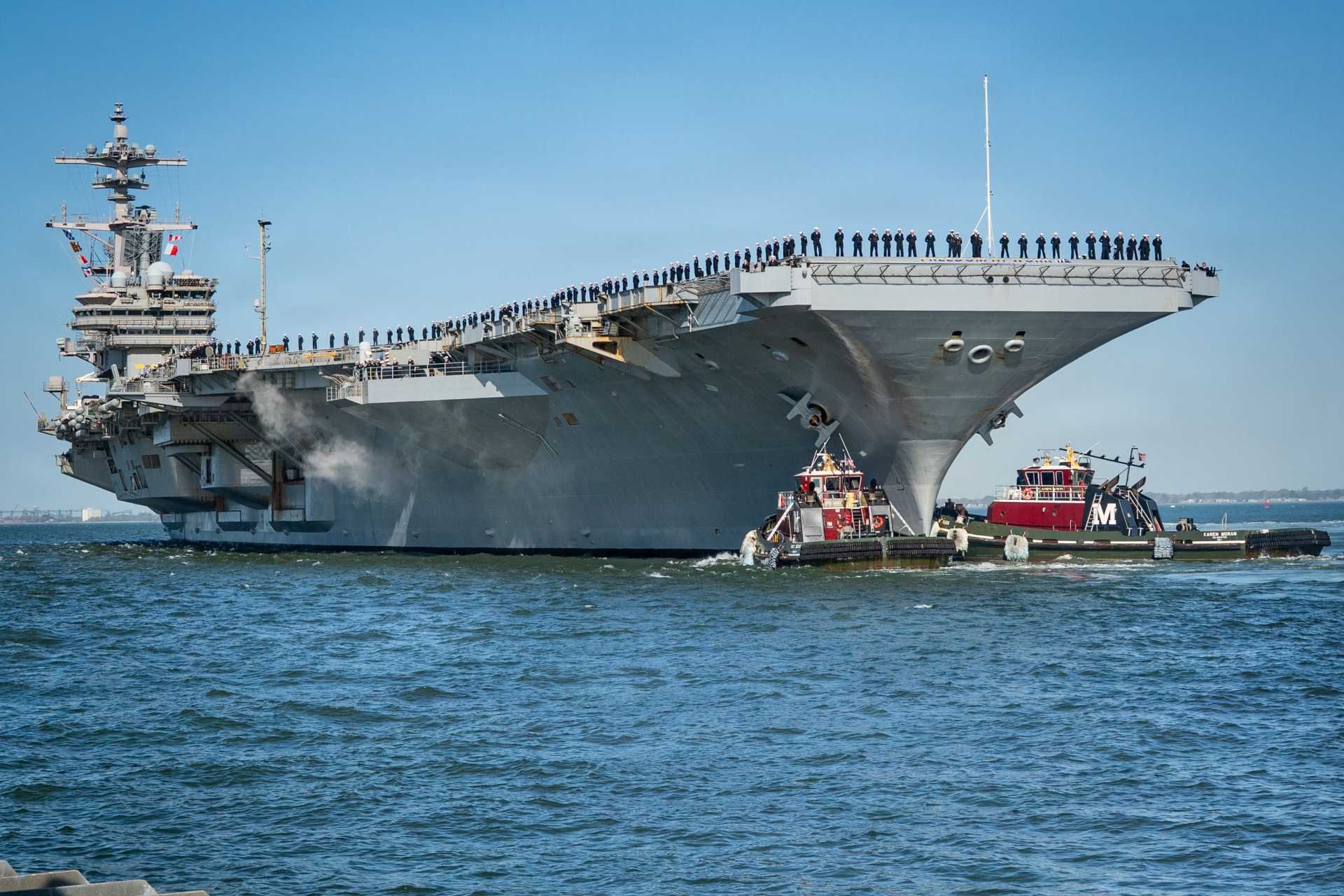 The Carrier Strike Group 10 deploys at a time when the USS Gerald R. Ford (CVN-78) was undergoing repairs in Croatia, while the USS Abraham Lincoln (CVN-72) was operating in the Arabian Sea, creating the conditions for a three-carrier posture in or near the Middle East. (Picture source: US Navy)