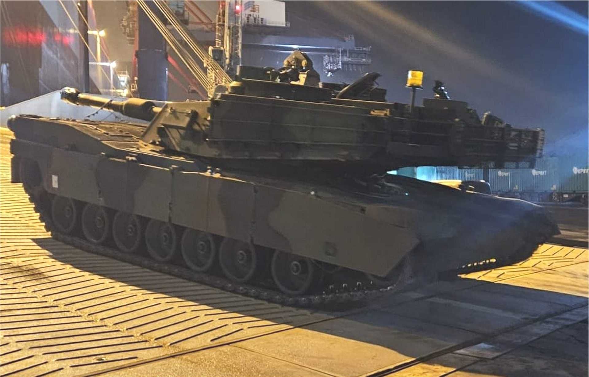 U.S.-made M1A2 SEPv3 Abrams main battle tanks arrive at a Polish military facility as part of a major defense agreement between Warsaw and Washington, marking a new phase in Poland's armored force modernization. December 1, 2025.