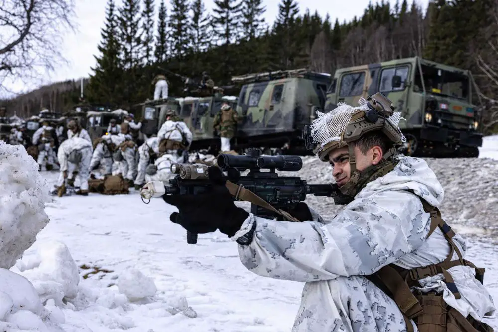 U.S. Marine Corps Lance Cpl. Thomas Toro secures position during Cold Response 26 in Setermoen, Norway, as U.S. Marines and NATO allies conduct force-on-force operations to validate integrated Arctic combat readiness and multinational coordination.
