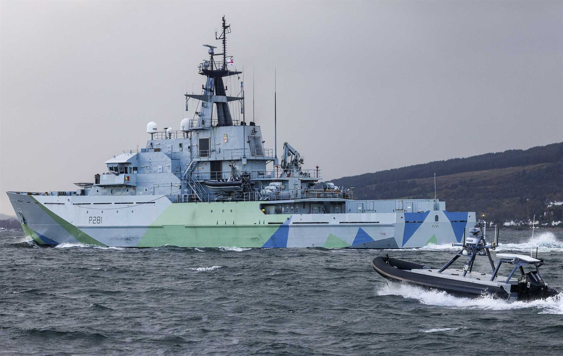 On October 28, 2025, a Rattler unmanned surface vessel leads British Navy offshore patrol vessel HMS Tyne in a live escort operation during a 72-hour British Royal Navy autonomy demonstration off the coast of Scotland.
