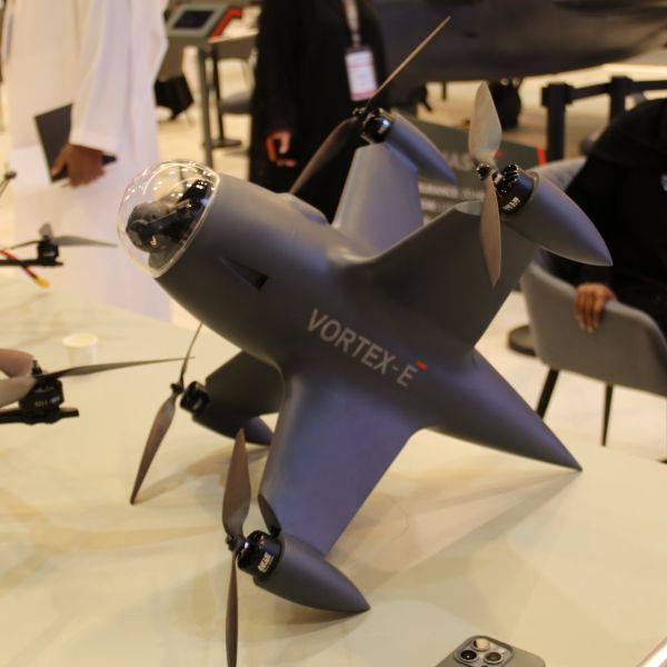 The EDGE VORTEX-E interceptor displayed at UMEX 2026, showcasing its front-mounted AI-tracking camera and aerodynamic profile designed for high-speed kinetic engagements. The system combines autonomous operation with manual control, reaching speeds of up to 350 km/h and a 24 km engagement range.