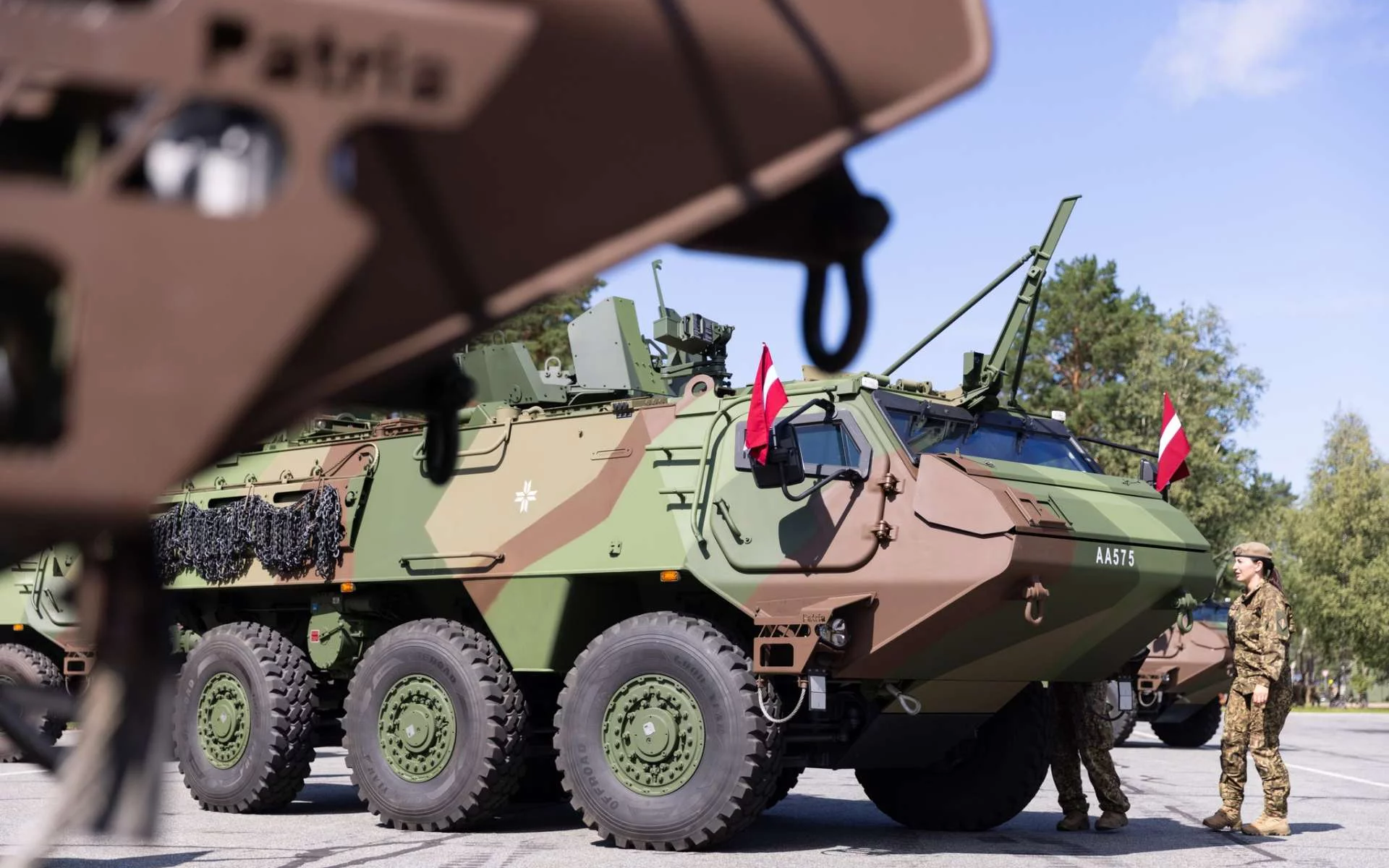 Latvian_Army_receive_first_locally_built_Patria_6x6_APC_925_001-46af55a1.webp