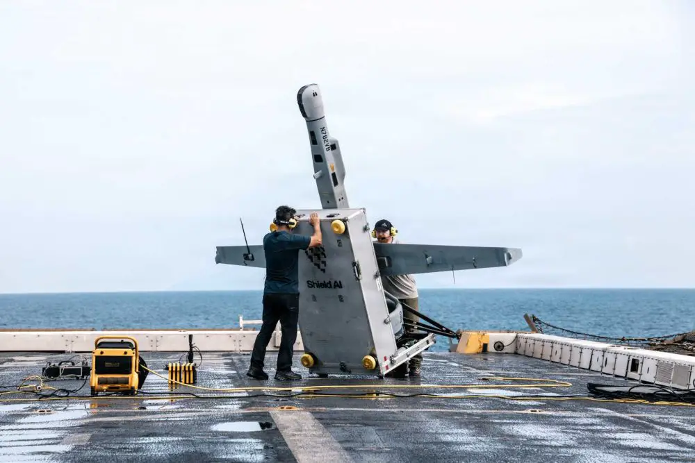 U.S. Department of War contractors prepare a VBAT vertical take-off and landing (VTOL) unmanned aerial system for launch aboard the San Antonio-class amphibious transport dock ship USS Portland (LPD 27) during operations in the Pacific Ocean on June 9, 2026. (Picture source: U.S. DoD)