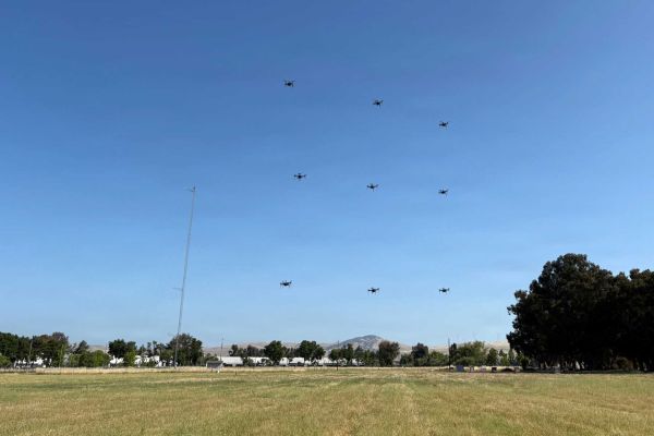 Multiple drones fly in coordinated formation during a swarm operation. AFRICOM's CURTAIN CALL program is exploring the use of defensive drone swarms as a low-cost solution to counter growing unmanned aerial system threats. (Picture source: AFRICOM)