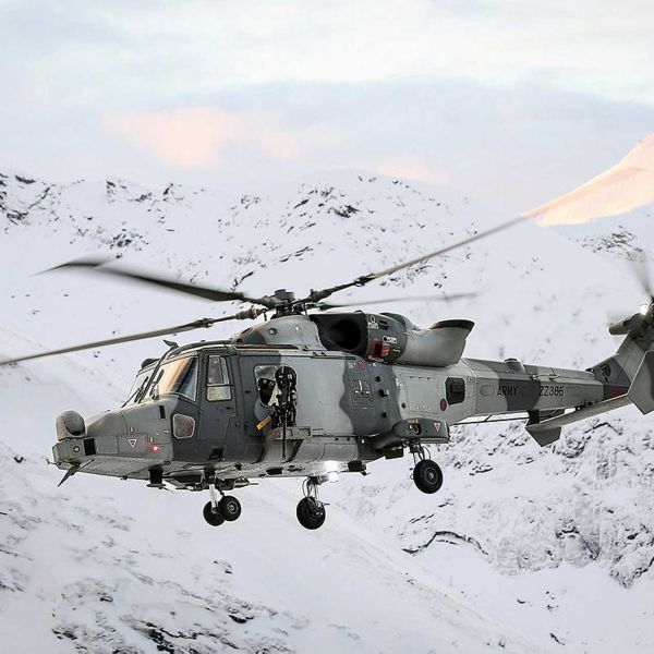 Wildcat HMA2 helicopters of the British Royal Navy’s 847 Naval Air Squadron fly low through Norway’s mountainous terrain during Operation Clockwork, honing Arctic combat and mountain flying skills above the Arctic Circle.