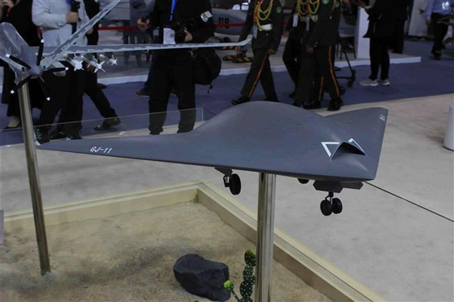 In November 2025, the Chinese Air Force showed a GJ-11 flying in formation with a J-20 and a J-16D, with a controller-to-pilot exchange indicating that the coordination had been established. (Picture source: Army Recognition)