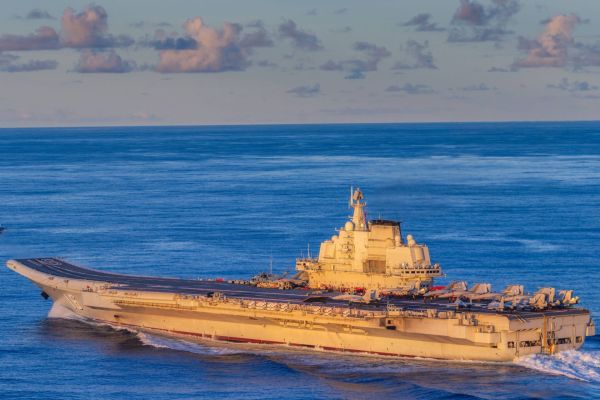 China’s aircraft carrier Liaoning sails in the Western Pacific during a carrier strike group deployment that included the Type 054B frigate Luohe for the first time. (Picture source: China Military)
