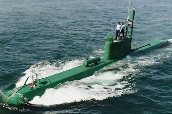 In the Strait of Hormuz, Iran’s small Ghadir-class submarines could hide near shipping lanes and launch sudden attacks, much like World War II midget submarines that exploited confined coastal waters to damage not only merchant ships but also battleships. (Picture source: Iranian MoD)