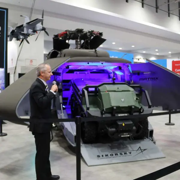 Front view of the Sikorsky S-70UAS U-Hawk unmanned helicopter unveiled at AUSA 2025, showing the fully removed cockpit section replaced by a forward cargo bay with actuated clamshell doors and integrated loading ramp.