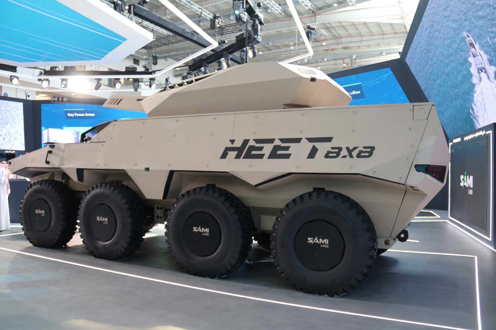 Unveiling of the HEET 8x8 fire support vehicle armed with a 105 mm turret at the Saudi Arabian Military Industries booth during World Defense Show 2026, highlighting a new Saudi-designed armored combat concept.