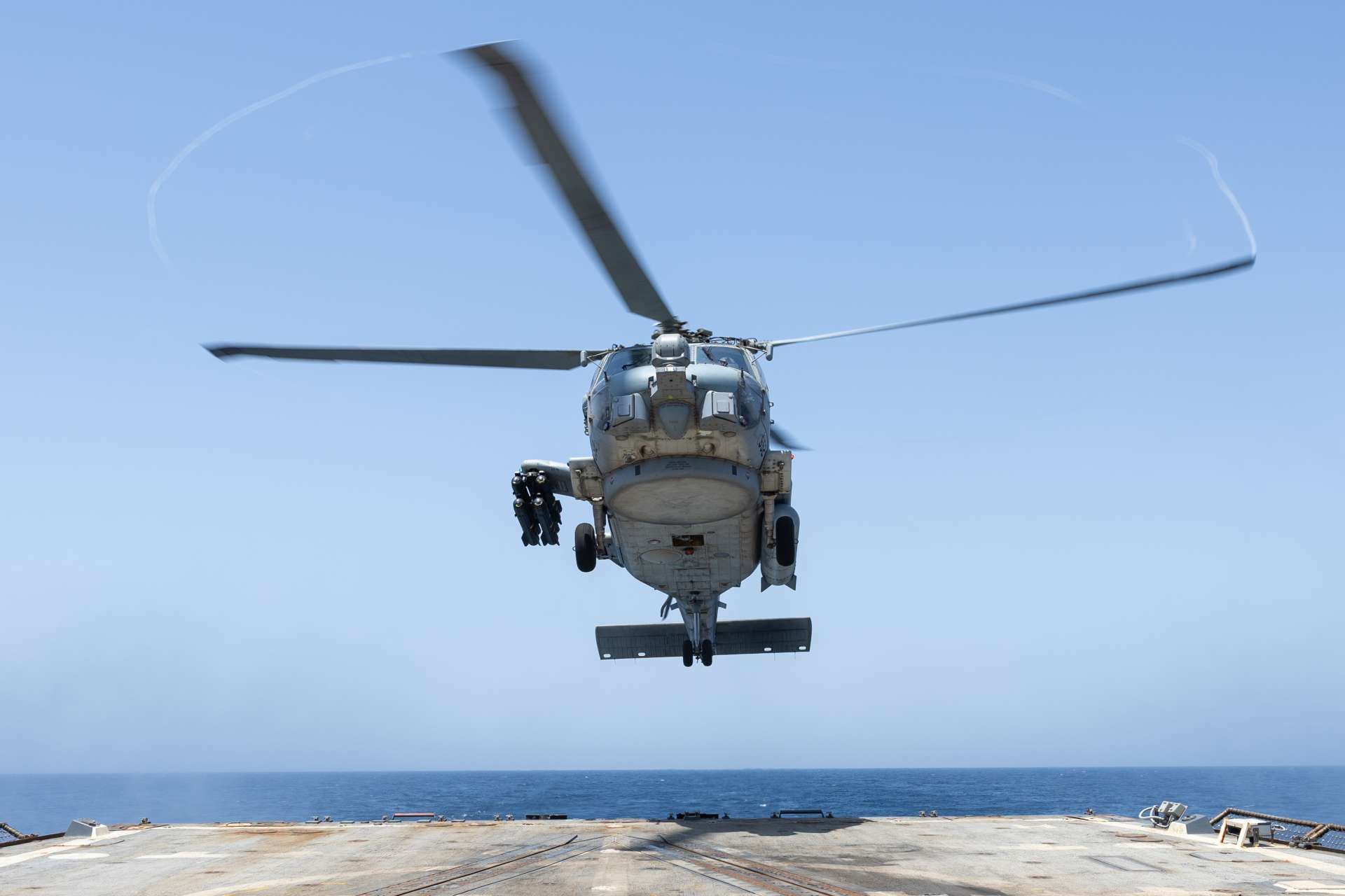 An MH-60R Seahawk from Helicopter Maritime Strike Squadron 50 lands aboard USS Truxtun in the Arabian Sea, where its sensors and precision weapons support U.S. blockade enforcement, maritime surveillance, and force protection near the Strait of Hormuz (Picture source: U.S. DoW).