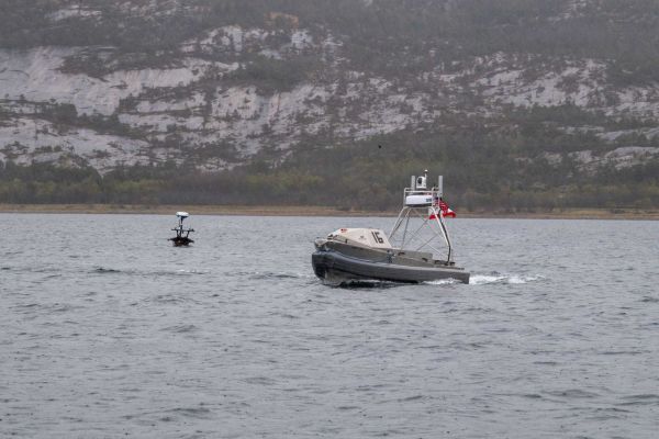 A Global Autonomous Reconnaissance Craft assigned to Commander, Task Force 66 operates in Breivika Bay during Arctic Sentry 2026, supporting U.S.-Norwegian unmanned maritime operations in the High North.