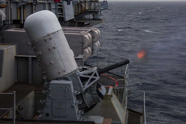 A Phalanx CIWS fires aboard USS Abraham Lincoln during a live-fire exercise, demonstrating the carrier’s layered defense against aerial and surface threats.