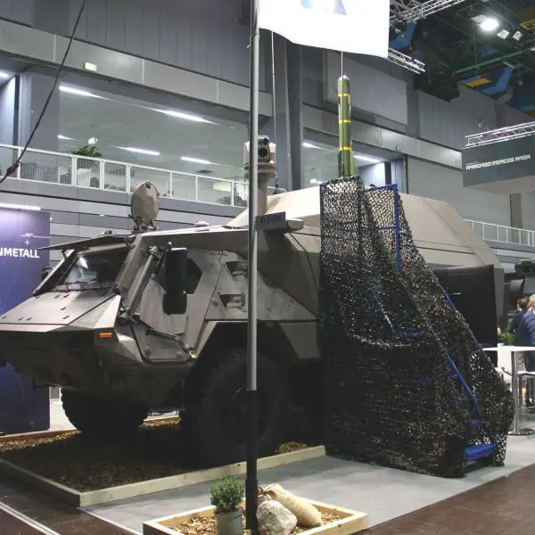 Germany's Rheinmetall Fuchs JAGM armored missile tank destroyer displayed at Enforce Tac 2026 in Germany, showcasing its 24-cell vertical launch system for AGM-179 JAGM and AGM-114L Hellfire missiles integrated on the 6x6 Fuchs armored platform.