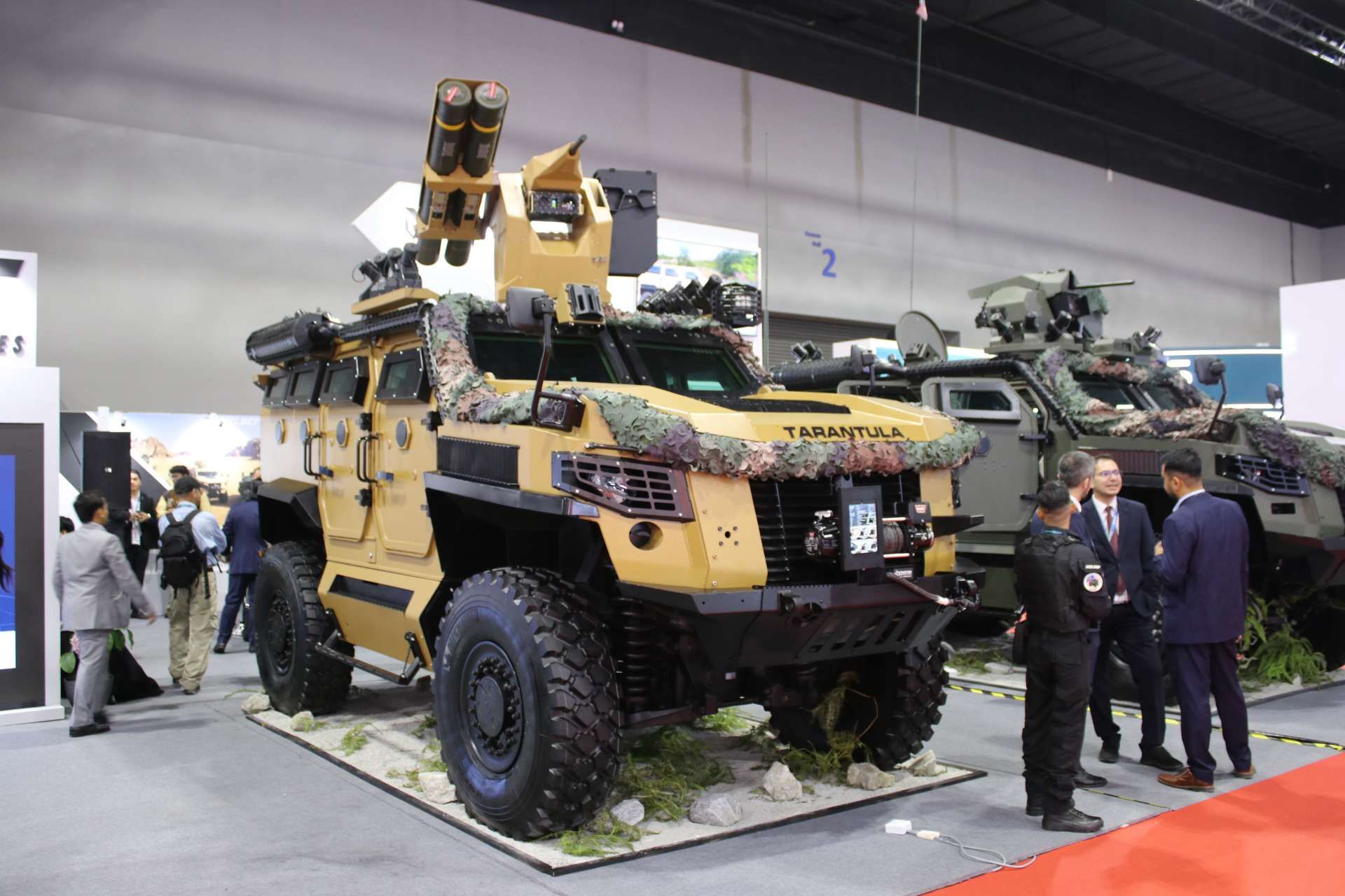 MILDEF’s Tarantula 4x4 armored vehicle displayed at DSA 2024 in Kuala Lumpur with a twin-launcher for Roketsan’s OMTAS medium-range anti-tank missile, highlighting a modular Malaysian approach to mobile protected anti-armor warfare (Picture source: Army Recognition Group).