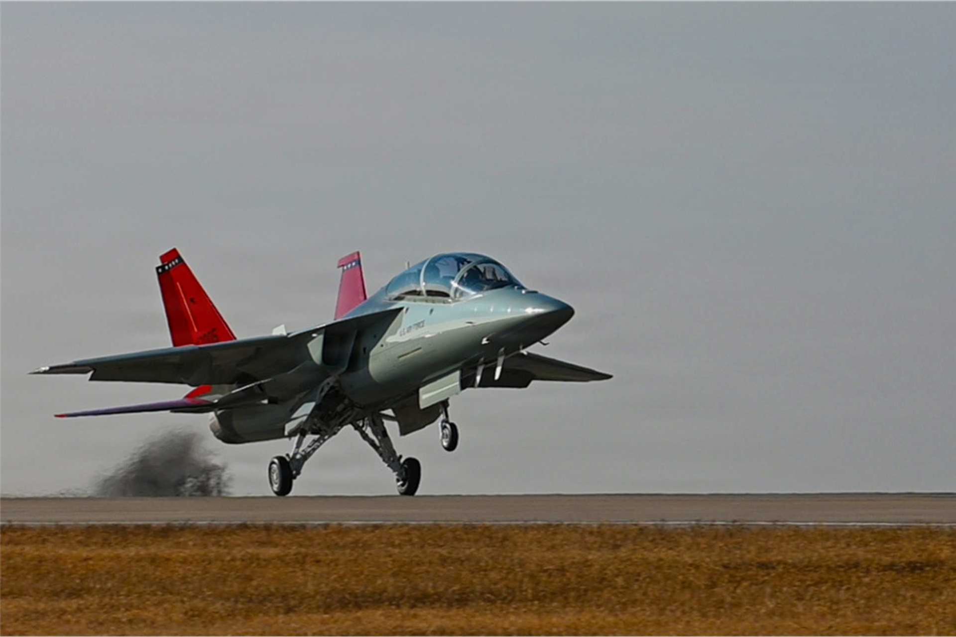 The T-7A RedHawk touches down for the first time at Vance Air Force Base, Oklahoma, on December 3, 2025. As the T-38 Talon nears retirement, the RedHawk advances its legacy with modern capabilities and a name that pays tribute to the Tuskegee Airmen.