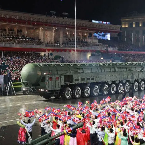 The Hwasong 20 intercontinental ballistic missile moves through central Pyongyang during North Korea’s October 2025 military parade, carried on an enlarged transporter launcher that analysts say underscores the regime’s push for greater range, mobility, and nuclear survivability.