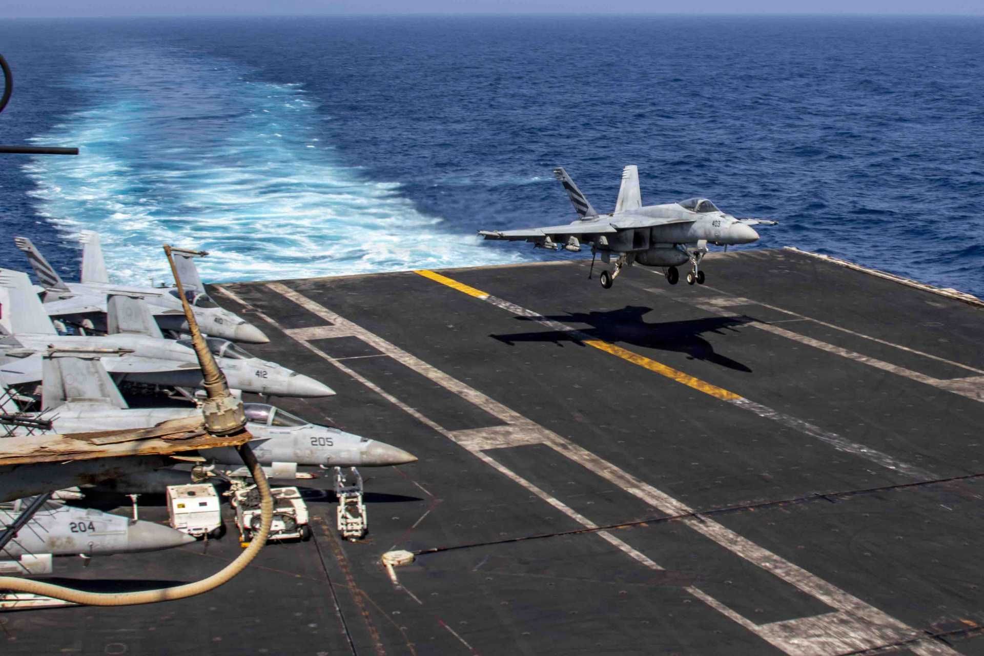 A U.S. Navy F/A-18E Super Hornet fighter jet assigned to Strike Fighter Squadron (VFA) 151 prepares for an arrested landing aboard the Nimitz-class aircraft carrier USS Abraham Lincoln (CVN 72) on June 2, 2026. Aircraft from Abraham Lincoln's Carrier Air Wing recently conducted a precision strike against the tanker M/T Marivex in the Gulf of Oman as part of U.S. blockade enforcement operations targeting maritime traffic bound for Iran.