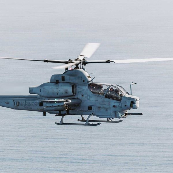 A U.S. Marine Corps AH-1Z Viper gunship assigned to Marine Medium Tiltrotor Squadron 163 (Reinforced), part of the 11th Marine Expeditionary Unit, conducts a flight over the Pacific Ocean on January 23, 2026.