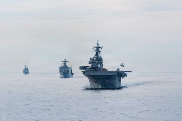 The Boxer Amphibious Ready Group, escorted by the Ticonderoga-class guided-missile cruiser USS Princeton (CG-59), executes a simulated strait transit in the Pacific Ocean on January 27, 2026. The maneuver strengthened Navy-Marine Corps integration and force protection procedures as the 11th Marine Expeditionary Unit conducted high-end integrated training operations in the U.S. 3rd Fleet area of responsibility.