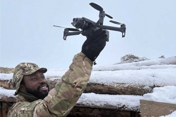 British soldiers from Dreadnaught Squadron, Royal Tank Regiment, operate a small tactical drone during sUAS training in Estonia, enhancing battlefield reconnaissance capabilities in coordination with NATO forces.