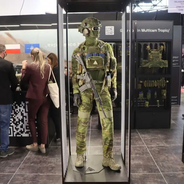 The mixture of green, brown, and darker tones used in camouflage patterns such as the Multicam Tropic disrupts the human eye’s ability to recognize a human form, making it more difficult for an observer to distinguish a person from surrounding foliage, trunks and branches. (Picture source: Army Recognition)