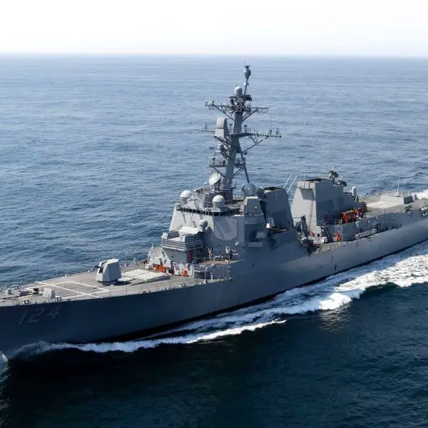 The future U.S. Navy USS Harvey C. Barnum Jr. (DDG 124), a Flight IIA Technology Insertion Arleigh Burke-class destroyer, underway during acceptance trials prior to delivery to the U.S. Navy, showcasing its Aegis combat system radar arrays and advanced multi-mission configuration.