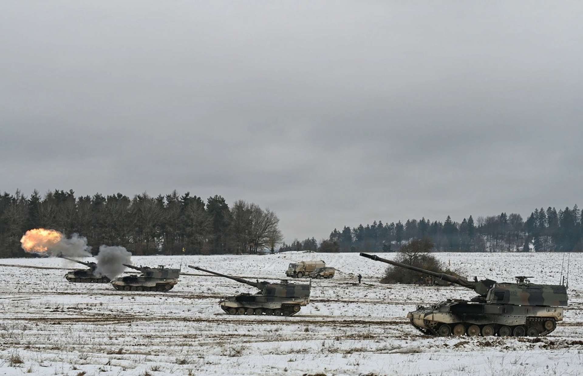 The PzH 2000 is a heavily armored 155 mm/L52 tracked self-propelled howitzer built for rapid shoot-and-scoot fires, able to deliver high bursts and sustained rates of fire, engage targets at extended ranges with NATO-standard ammunition, and rapidly displace to survive counter-battery threats while supporting fast-moving armored formations (Picture source: U.S. DoW).