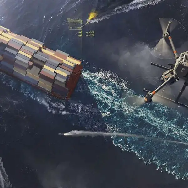 DARPA’s Pulling Guard pairs a towed semi-autonomous escort craft with tethered aerial sensors to spot and defeat hostile small boats and USVs, giving unarmed logistics and merchant ships a scalable, modular layer of convoy protection without relying on high-end warships (Picture source: DARPA).