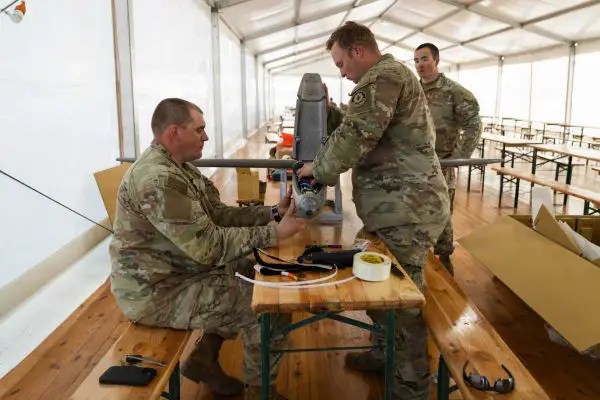 U.S. Army Staff Sgt. Nicholas Davis and Staff Sgt. Terrence Giles of the Field Artillery Squadron, 2d Cavalry Regiment, assemble a Hornet one-way attack drone during training and tactical integration exercises at the Bemowo Piskie Training Area in Poland as part of NATO’s Eastern Flank Deterrence Initiative running from April 27 to May 31, 2026.