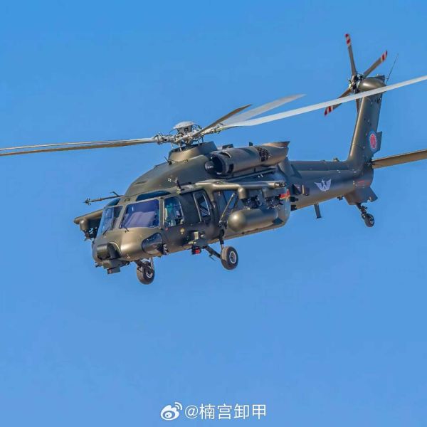 The Z-20T combines troop transport and air-to-ground strike capability with detachable short wings carrying ATGMs and rocket pods, and will be deployed alongside Z-10 and Z-21 attack helicopters, as well as from Type 071 and Type 075 ships. (Picture source: Weibo/@楠宫卸甲)