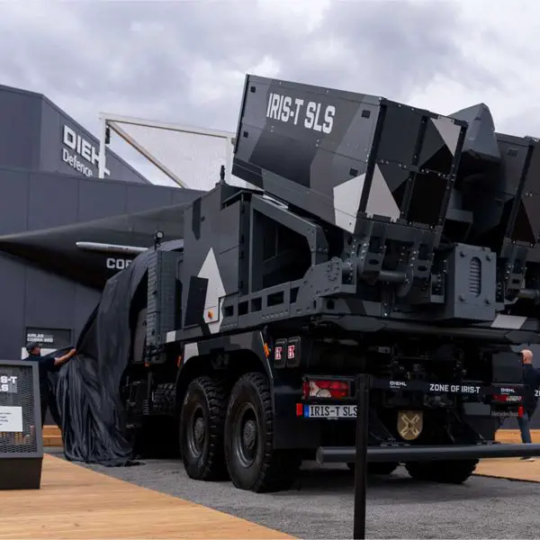 The new IRIS-T SLS Mk 4 short-range air defense system displayed by Diehl Defence at ILA 2026 in Berlin. The highly mobile all-in-one system integrates radar, command-and-control functions, and an eight-missile launcher on a single vehicle, providing rapid-response protection against aircraft, helicopters, cruise missiles, drones, and loitering munitions.